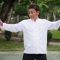 old man practicing kungfu or tai chi in the park, healthy lifestyle meditation exercise concept